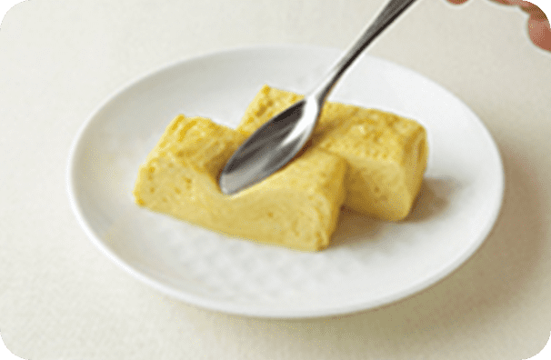 歯ぐきでつぶせる区分のたまごのかたさの目安（だし巻き卵）